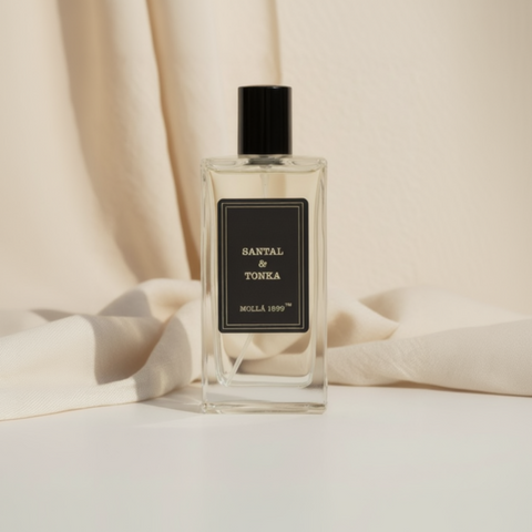 Cereria Mollá Santal and Tonka room and body spray bottle with yellow box on neutral linen background.