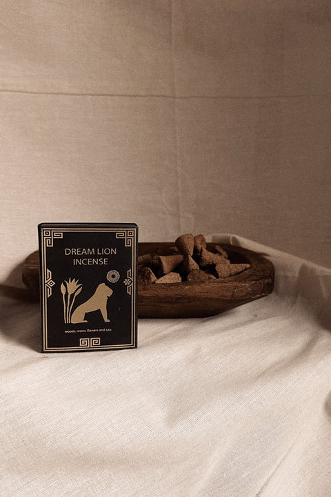 Dream Lion Incense The Wish Granter box styled with incense cones in wooden bowl.