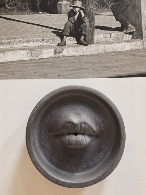 Ash Grey Lip Incense Burner styled with vintage photograph in neutral interior setting.