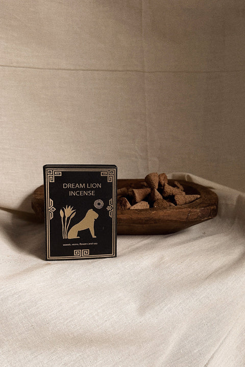 Dream Lion Incense The Wish Granter box styled with incense cones in wooden bowl.